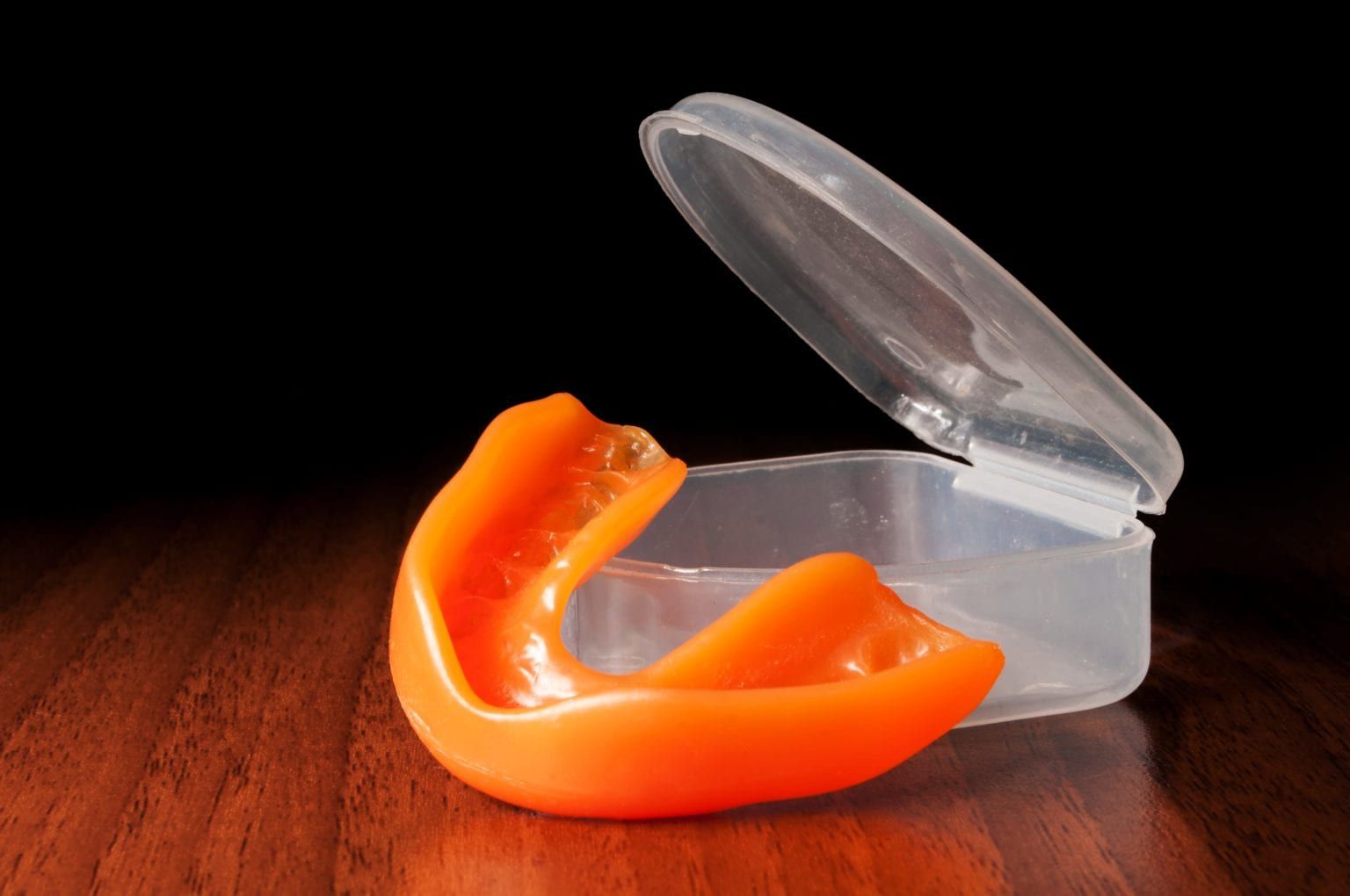 A Sports Mouth Guard outside of its case