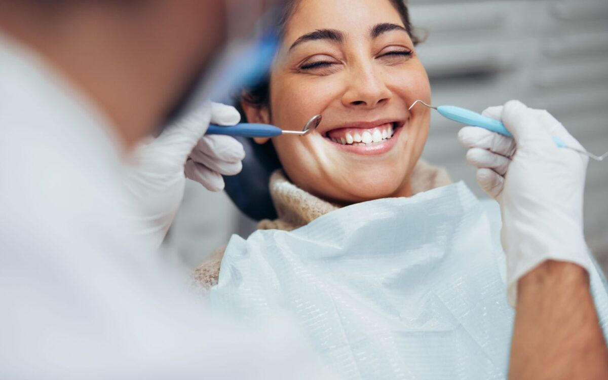 Woman Smiling at Dental Visit